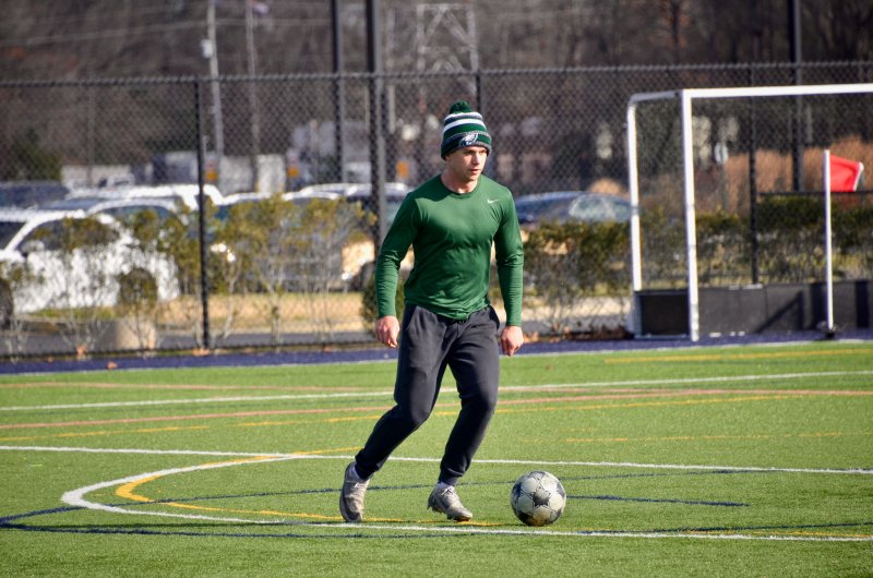 Riley Custodio controls the ball.