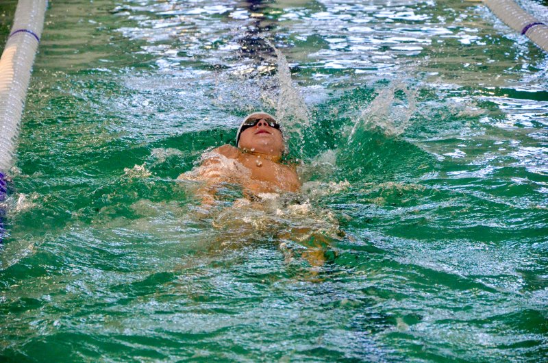 Seahawks junior Michael Whitaker wins the backstroke.
