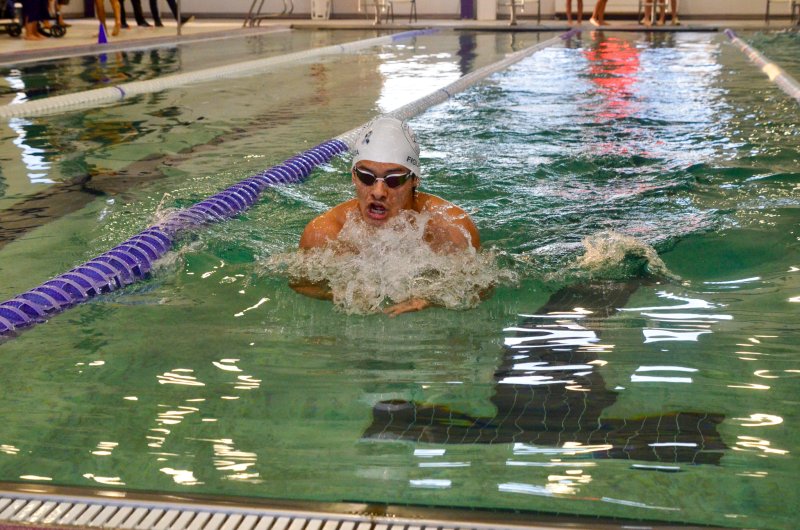 Sussex Academy senior Angel Figueroa prepares to turn during the breaststroke.