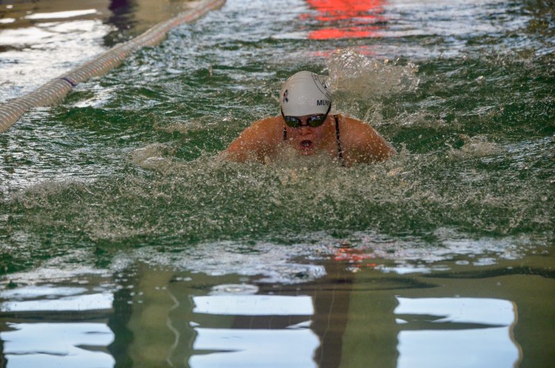 Seahawks junior Anna Mumford swims the breaststroke leg of the 200 individual medley.