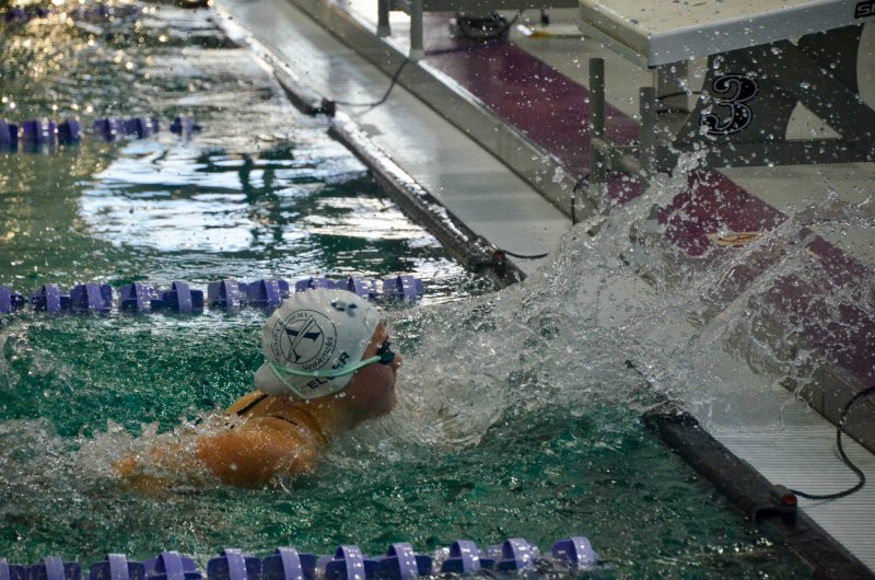 Seahawks eighth-grader Catherine Elder taps the wall.