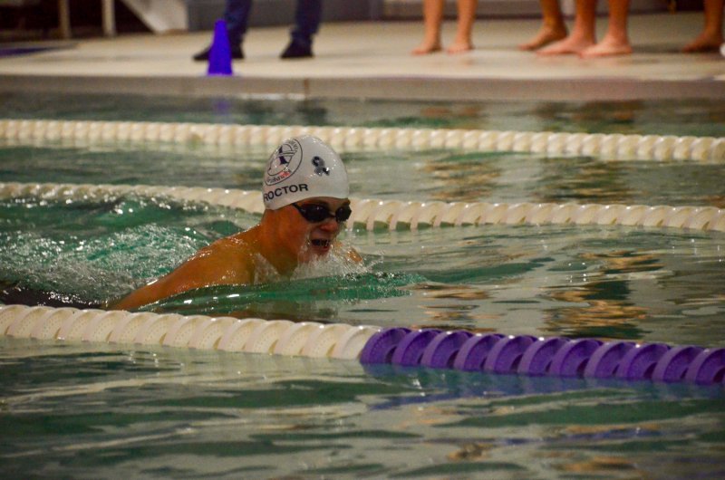 Sussex Academy sophomore Jackson Proctor surfaces for oxygen.