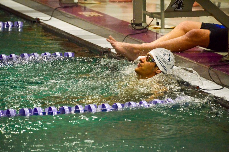 Sussex Academy senior Angel Figueroa rests after wrapping up the 400 relay.