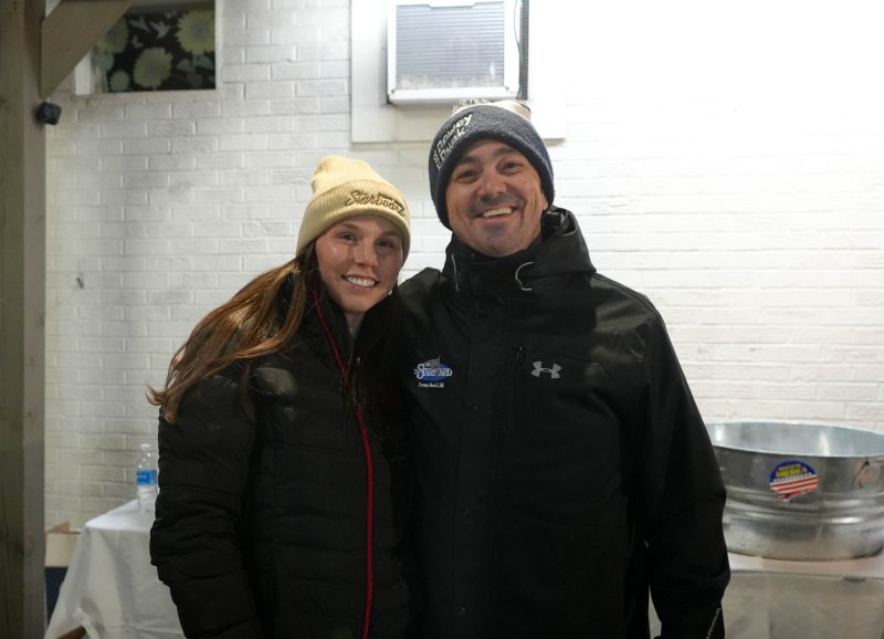 The Starboard’s Dylan Scerri, left, and Doug Moore are ready to serve drinks to people at the Fifer’s tree-lighting.