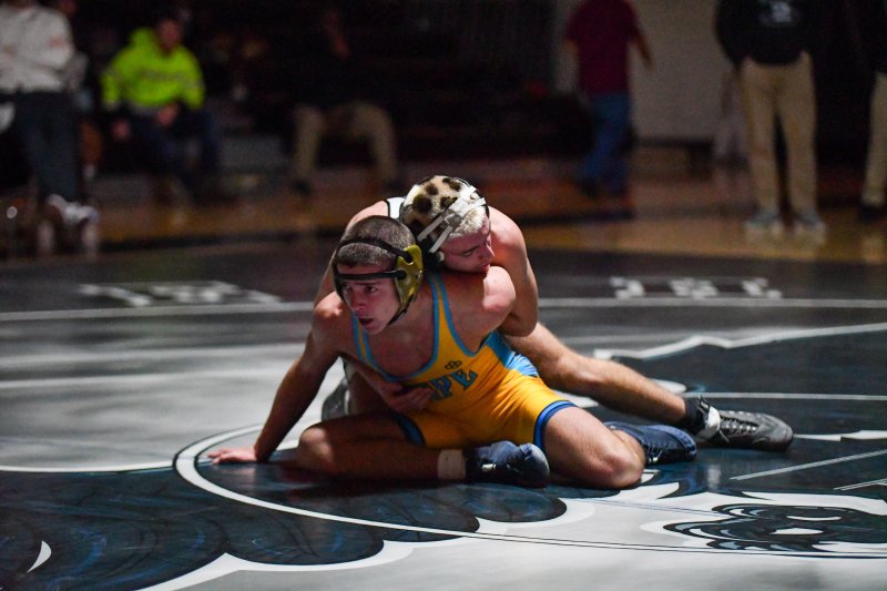 Sussex Tech’s Logan King controls Tripp Gannon at 144 pounds.