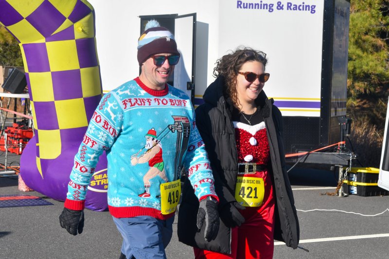 Craig Hall and Katherine hall cross the line in 53:15.