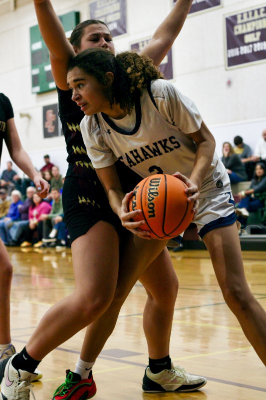 Sussex Academy freshman Barb Carneiro-Duarte works the low block.