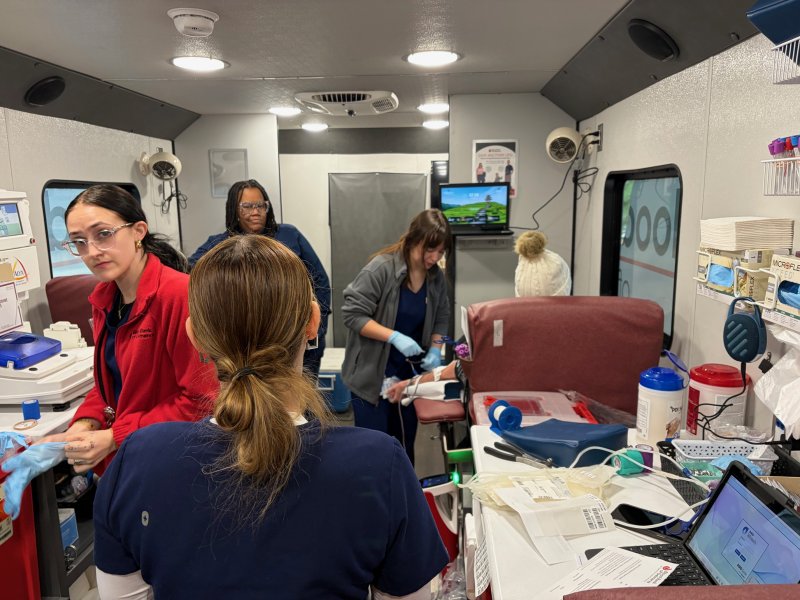 Staff from the Blood Bank of Delmarva work during a holiday blood drive held at Dogfish Head in Milton Dec. 26.