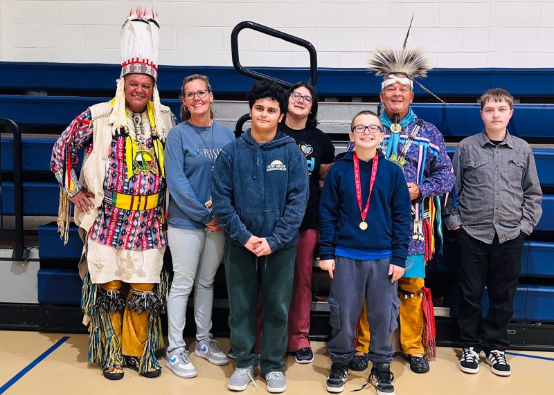 Gathered for a group photo are (l-r) Herman Jackson, educator Kelly Lehman, Vincent Troise, Rebecca Dietze, David Bradley, Michael Harmon and Jacob Cahall.