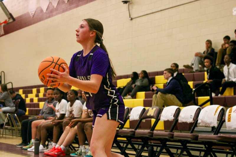 Royals sophomore Avery McCoy eyes up a three.