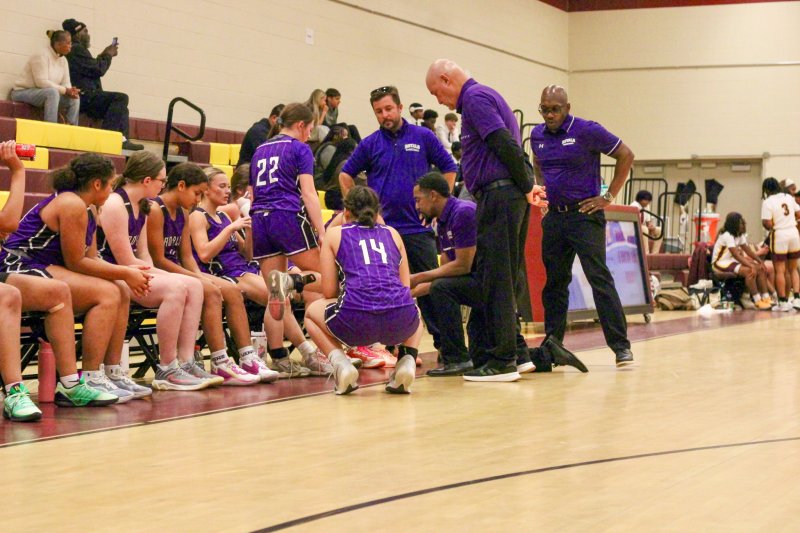 Delmarva Christian coach Frank Roach goes over the game plan to seal the deal.