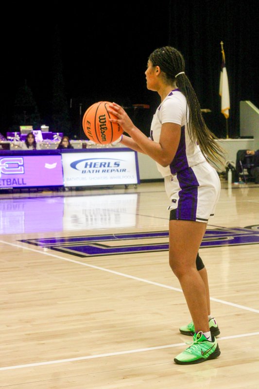 Delmarva Christian senior Eva Elliott dribbles on the perimeter.