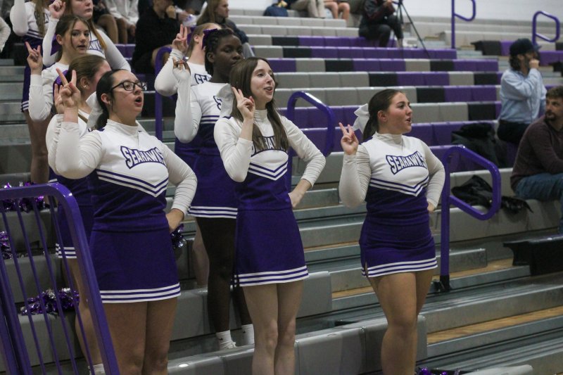 Sussex Academy’s cheerleaders try to help their team.