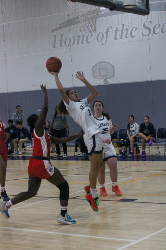 Sussex Academy freshman Barb Carneiro-Duarte takes a shot in close.