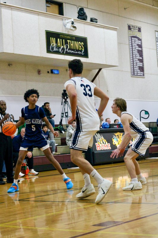 Sussex Academy sophomore Rico Nock takes on a double team.