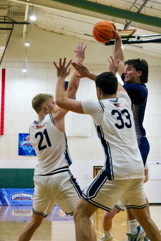 Seahawks sophomore Mason Glover kicks the ball out as the defense collapses in.