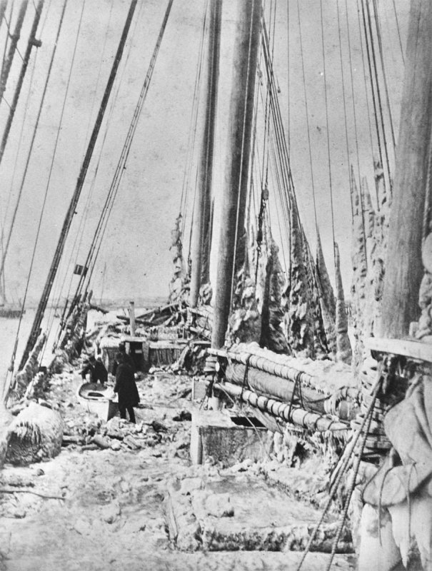 This photograph shows men on a snowy, icy boat in Delaware Bay. SOURCE: DELAWARE PUBLIC ARCHIVES