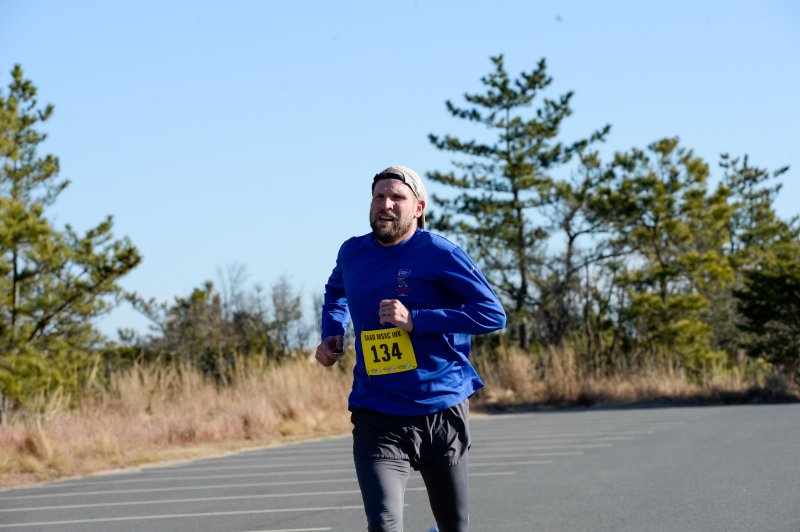 Tim Pagano wins the race in 17:43.