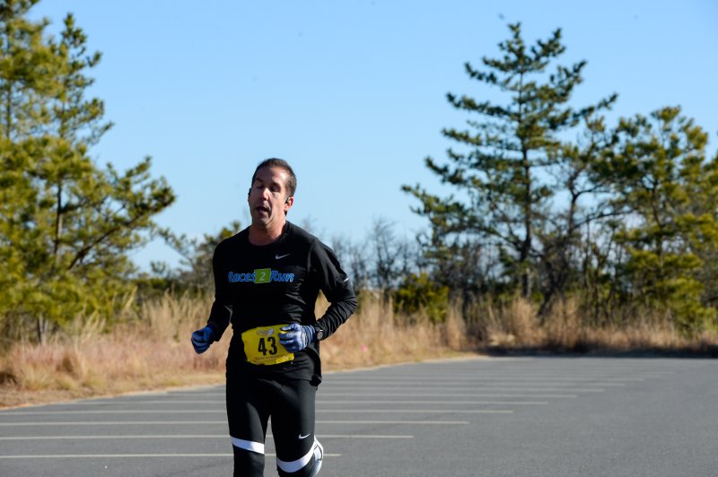 Matt Sparacino takes second place with a time of 18:07.