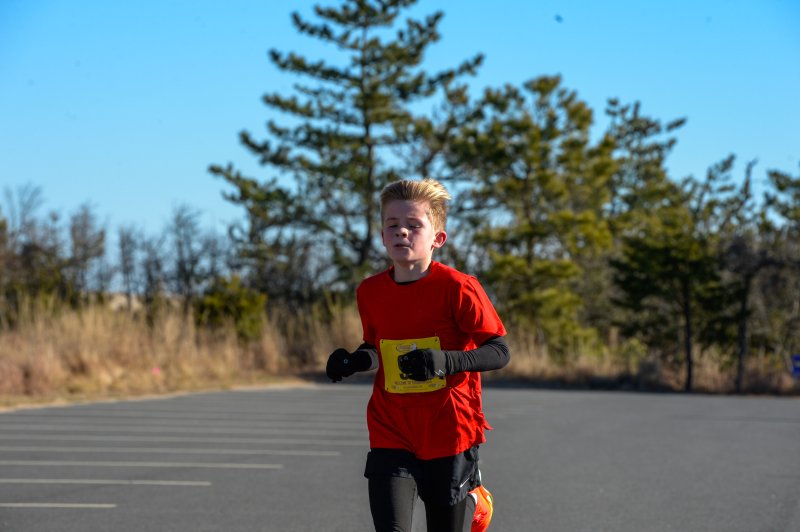 Deacon Odenwelder is third overall with a time of 21:09.