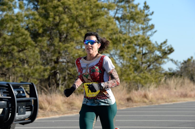 Teri Welsh of Lewes is third in 23:44.