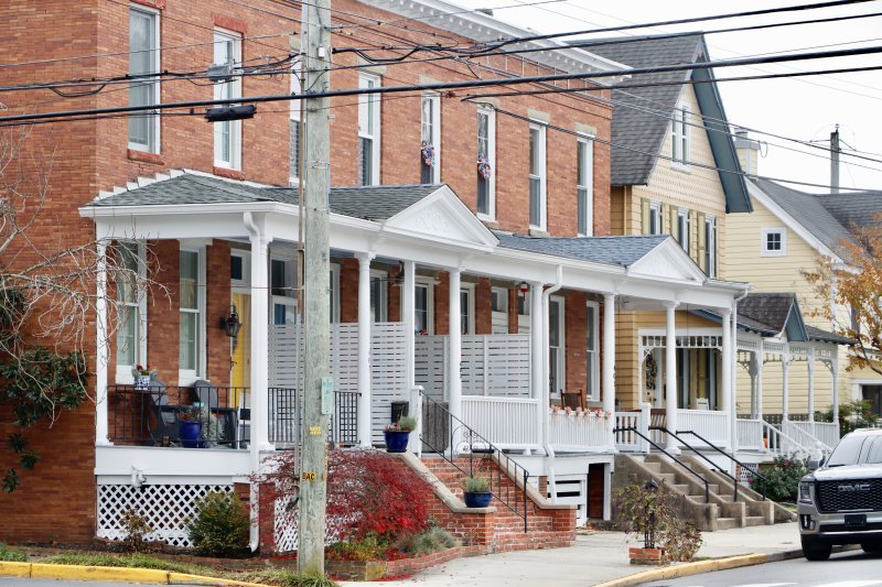 The line of historic rowhouses on Savannah Road at the center of a controversial dog-grooming business. A couple wants to open the business in their basement at 405 Savannah Road, which their neighbors oppose. BILL SHULL PHOTO
