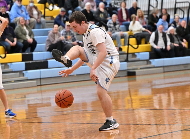 Cape sophomore Zackary Valles does some fancy dribbling in the 54-48 victory over Polytech.