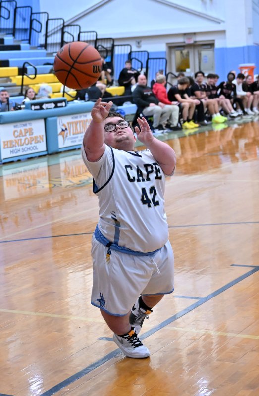 Cape sophomore Norman Rust hits a shot in the paint.