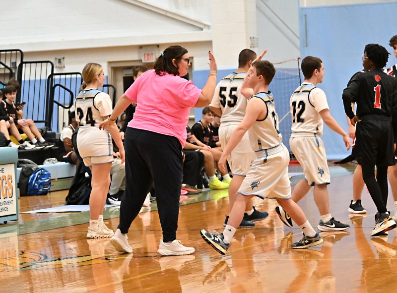 Cape coach Katie Collick congratulates Luke Archer.