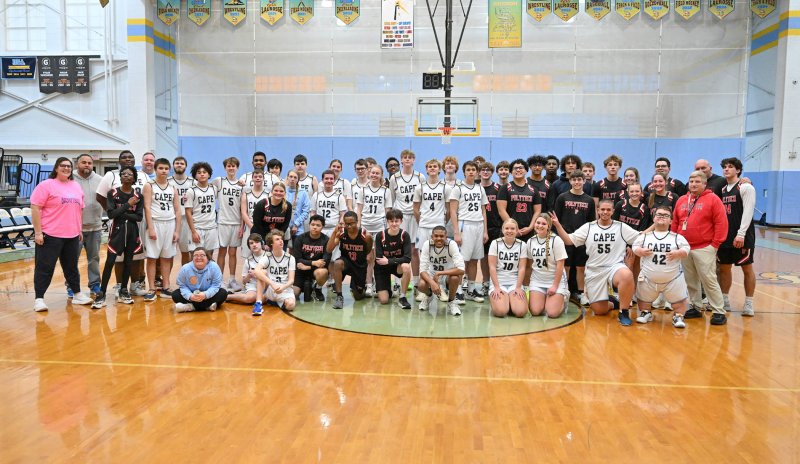 The Cape and Polytech teams get together for a friendly picture after the game.