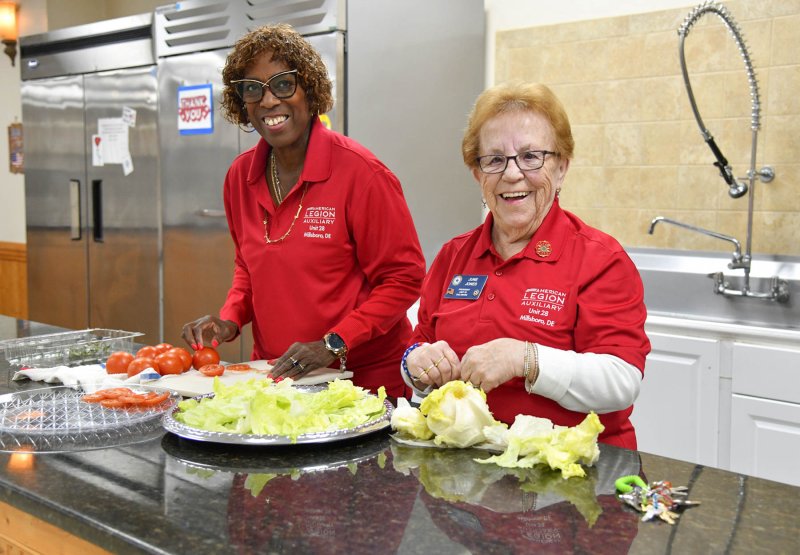 Tina Washington, Unit 28 PR chair, left, and Unit 28 Auxiliary President June Jones prepare lunch for the volunteers at the Dr. Martin Luther King Jr. Day of Service.