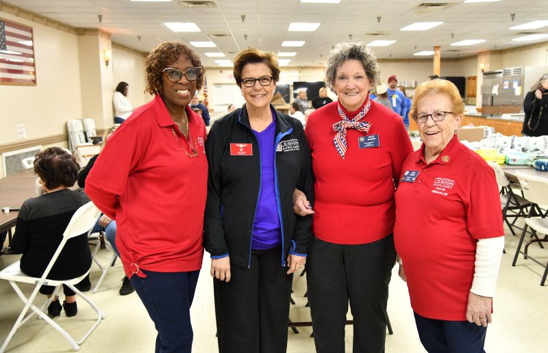 Getting together for a picture are (l-r) Tina Washington, Auxiliary Unit 28 PR chair; Pam Ray, American Legion Auxiliary national president; Beth McGinn, Auxiliary Unit 28 vice president; and June Jones, Auxiliary Unit 28 president.