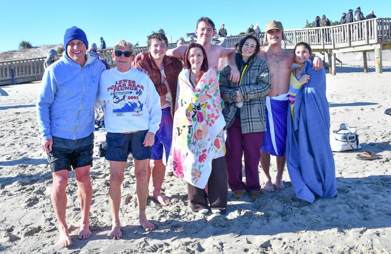 Longtime plunger Connie Miller has a long legacy of Polar Bears. Shown are (l-r) son JD Miller, Connie, Jack Wiggins, Bella Deblasio, Evan Jarrell, Julia Canto, Zane Miller and Avary Miller, who turned 18 at 12:02 a.m., Jan. 1.