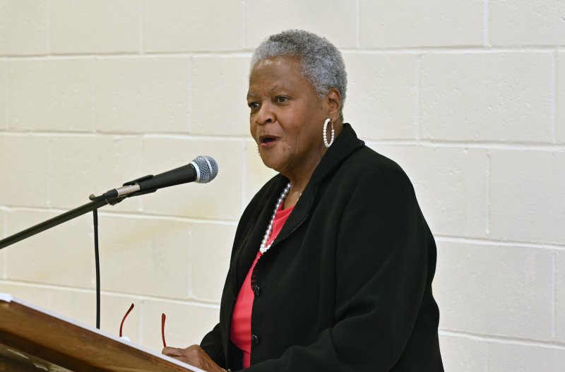 Mistress of Ceremonies Waynne H. Paskins welcomes the audience and gives the evening’s itinerary.