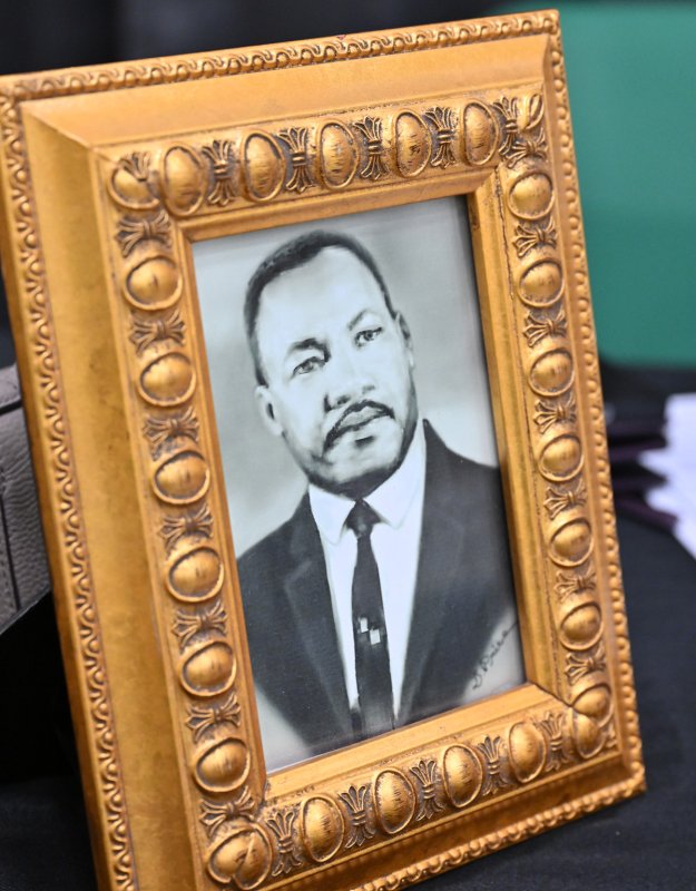 Doris Price, an artist from Millsboro, donated this painted picture of Dr. Martin Luther King Jr. to be raffled off at the event.