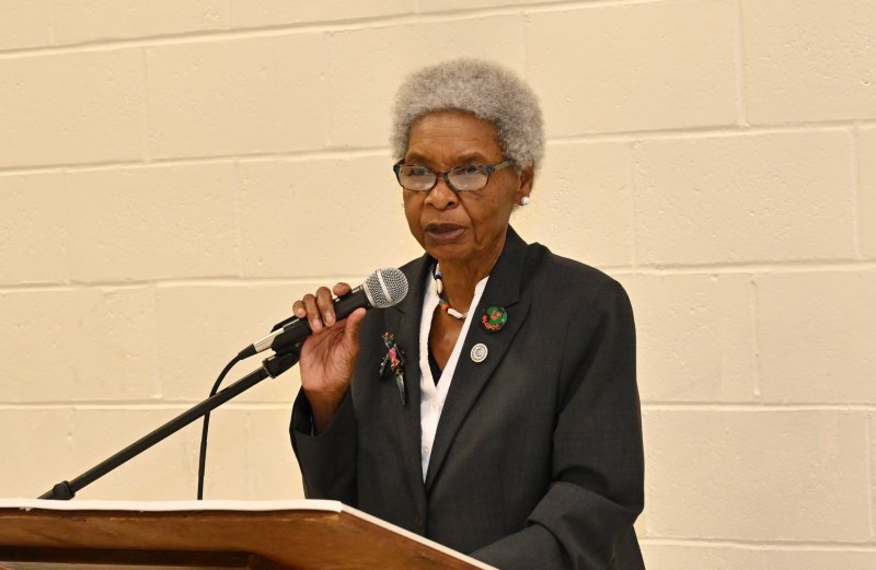 Dr. Marlene Sanders of the Delaware State University’s board of trustees introduces keynote speaker Dr. Debbie Harrington