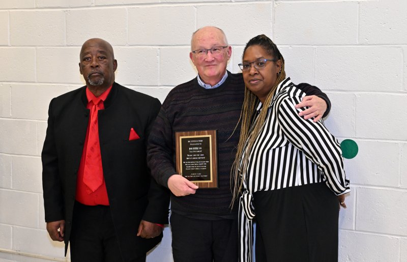 Don Peterson, immediate past vice president of the Dr. Martin Luther King Jr. Celebration Organization Sussex County Inc. is presented with a plaque of appreciation. Shown are (l-r) Clem Jordan, organization president; Peterson; and member Katina Gooch.