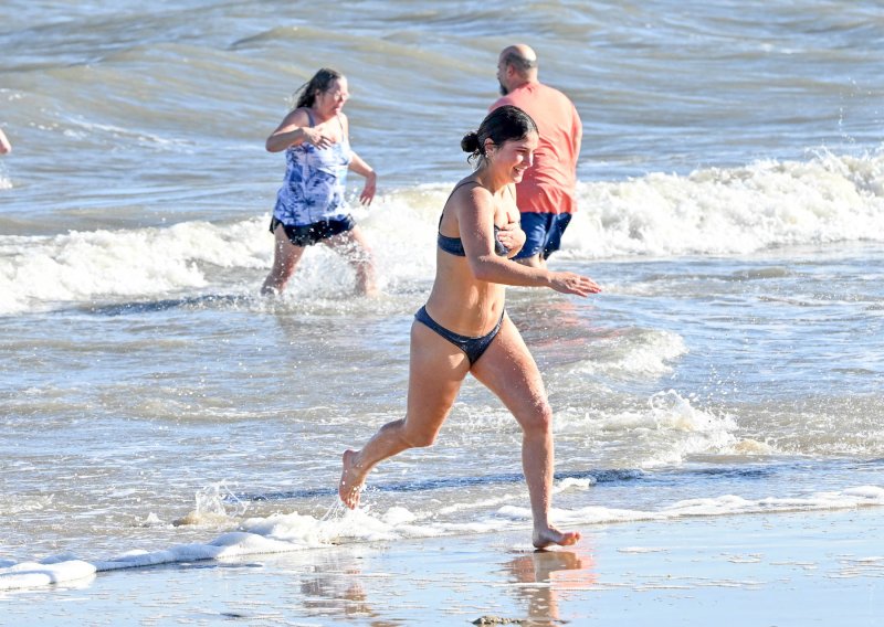 Avary Miller takes the plunge to celebrate her 18th birthday on New Year’s Day.