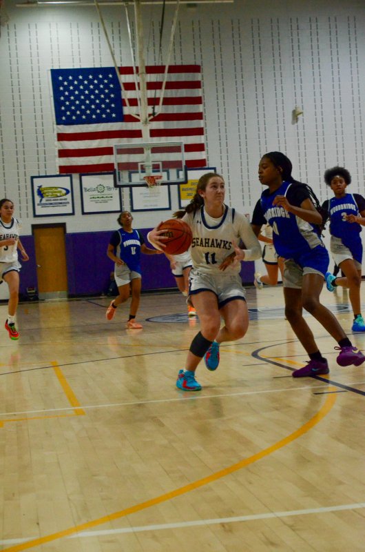 Sussex Academy sophomore Reilly Mobilia tries to free her hands.