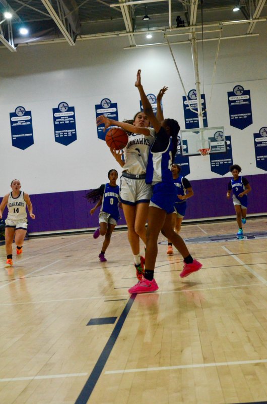 Sussex Academy freshman Barb Carneiro-Duarte is fouled.