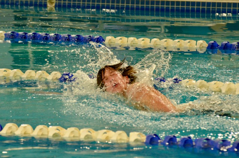 Seahawks freshman Eddie Hale lost his swim cap and had to deal with some hydro-lettuce during the 500 freestyle.