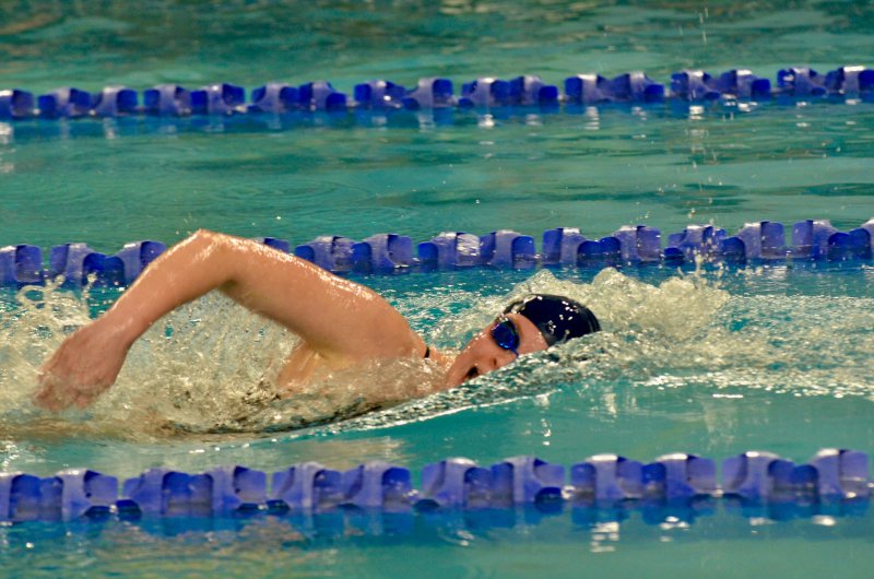Sussex Academy junior Anna Mumford flexes her dominance in the 500 freestyle.