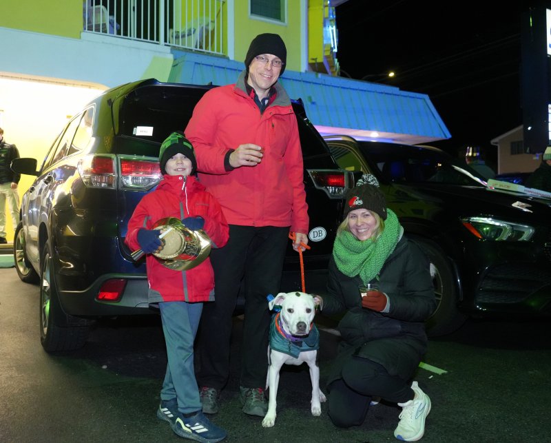 The Carroll Family and their dog, Dottie, brave the cold at the Crush Drop in Dewey Beach. Shown are (l-r) Oscar, Rory and Abby.