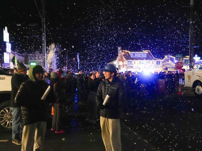 Confetti fills the air as the clock strikes midnight in Dewey Beach.