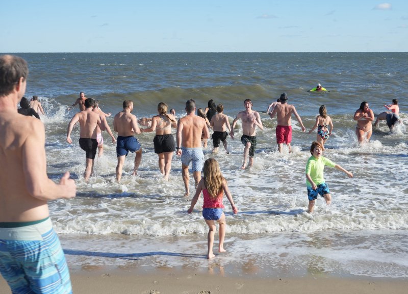 Dewey Dunk participants brace for the cold.