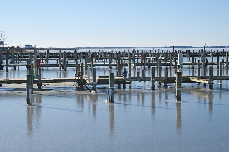 Docks in Dewey Beach are surrounded by ice.