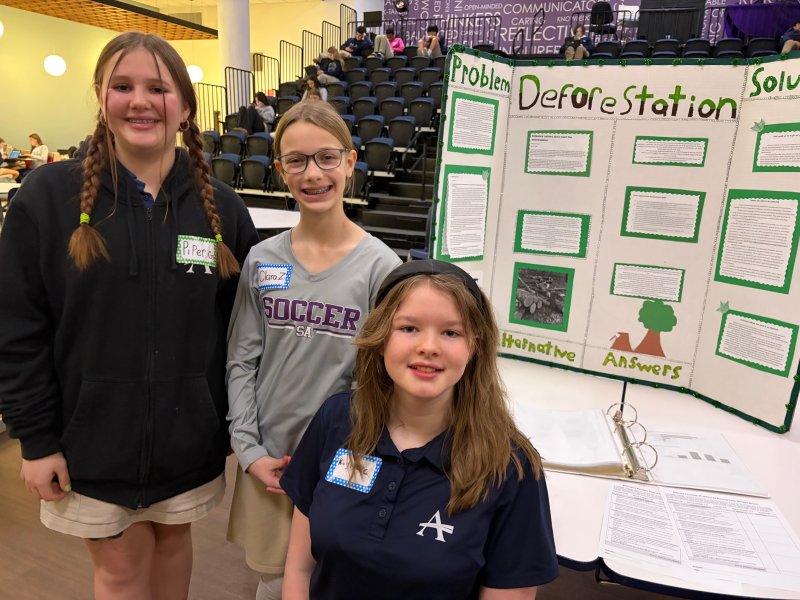 Presenting on the issue of deforestation are (l-r) Piper Graves, Clara Zimmerman and Kaylee Cale. RYAN MAVITY PHOTO