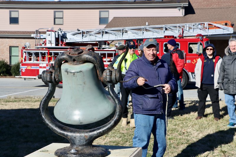 David Ludlow of the Lewes Junction Railroad and Bridge Association rings the 400-pound bell from a 1913 locomotive Jan. 1. The rest of the engine is expected to arrive in March or April. It will be reassembled on the track in Stango Park. BILL SHULL PHOTOS