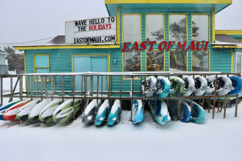 As the snow plow reflected in the window reminds us, Dewey Beach is way east of Maui. BILL SHULL PHOTO