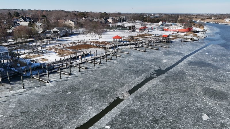 A narrow path allows some vessels to make it through the ice.